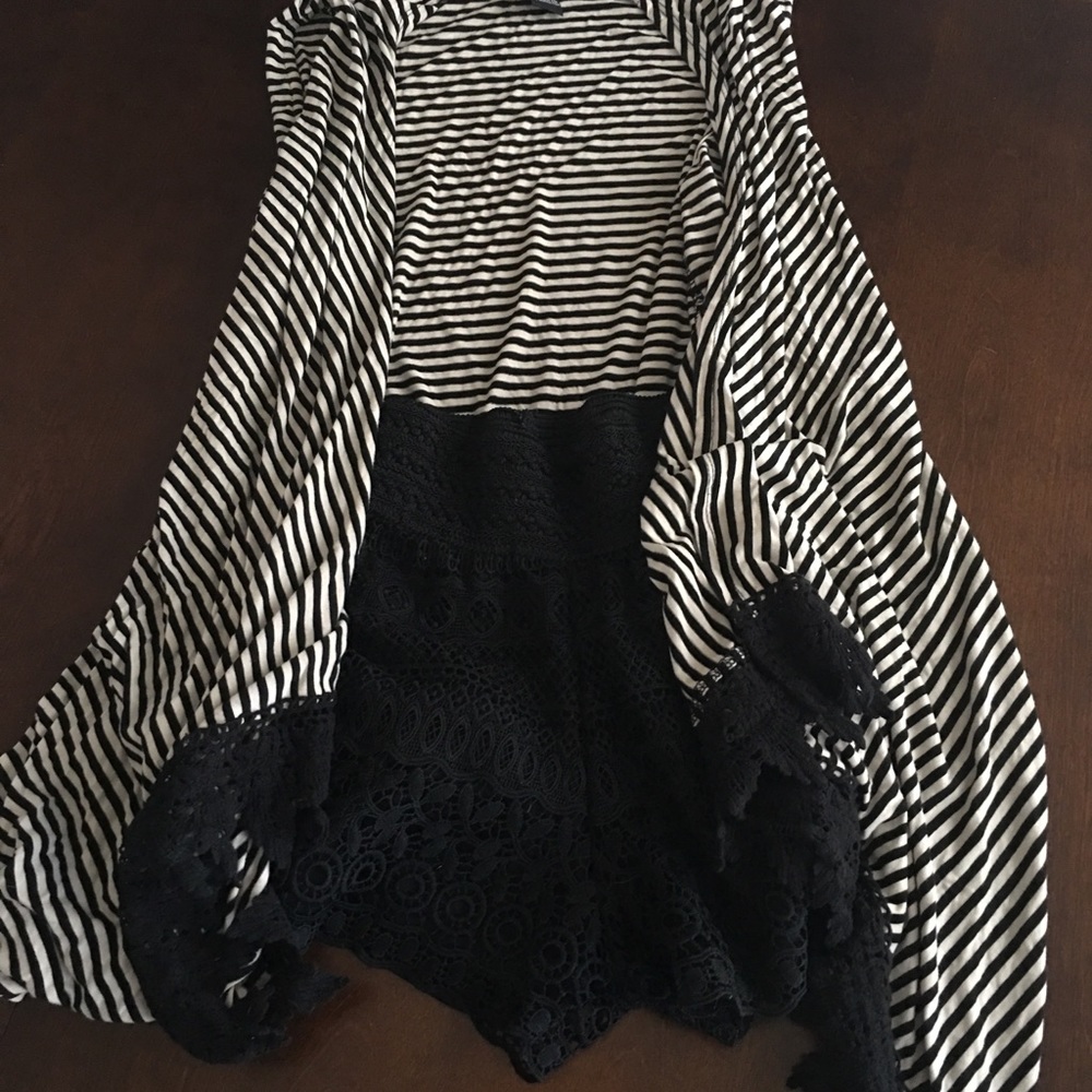 Sleeveless open front cardigan/vest